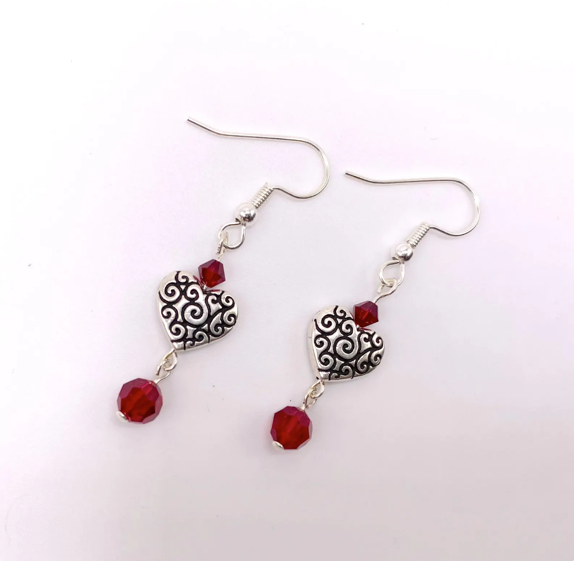 Silver Scroll Heart Red Crystal Earrings